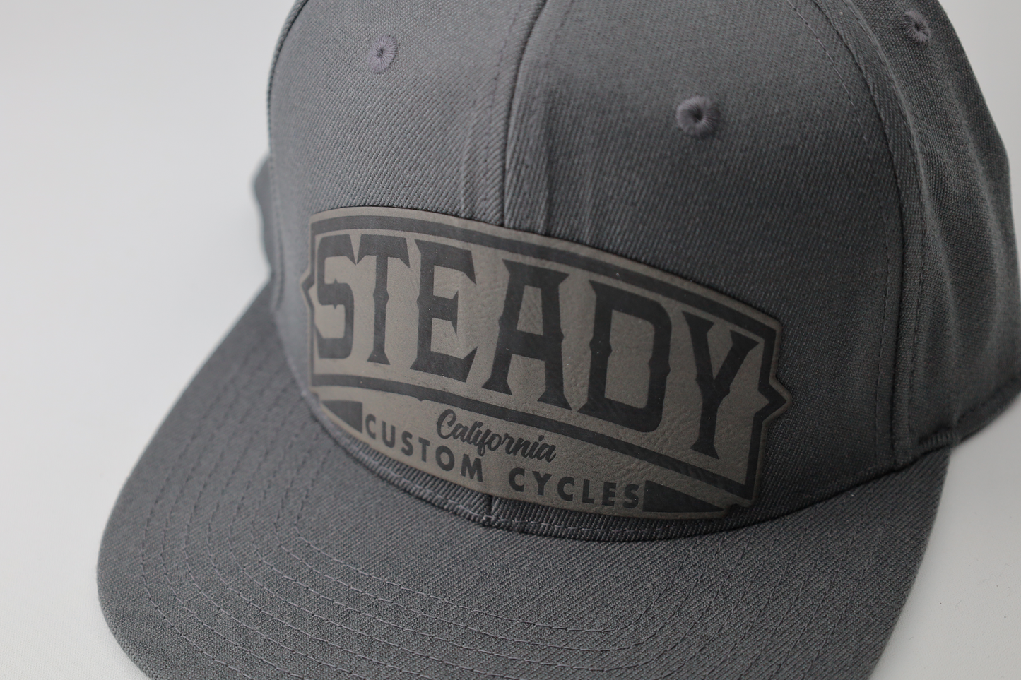SCC LEATHER PIECE SNAPBACK HAT
